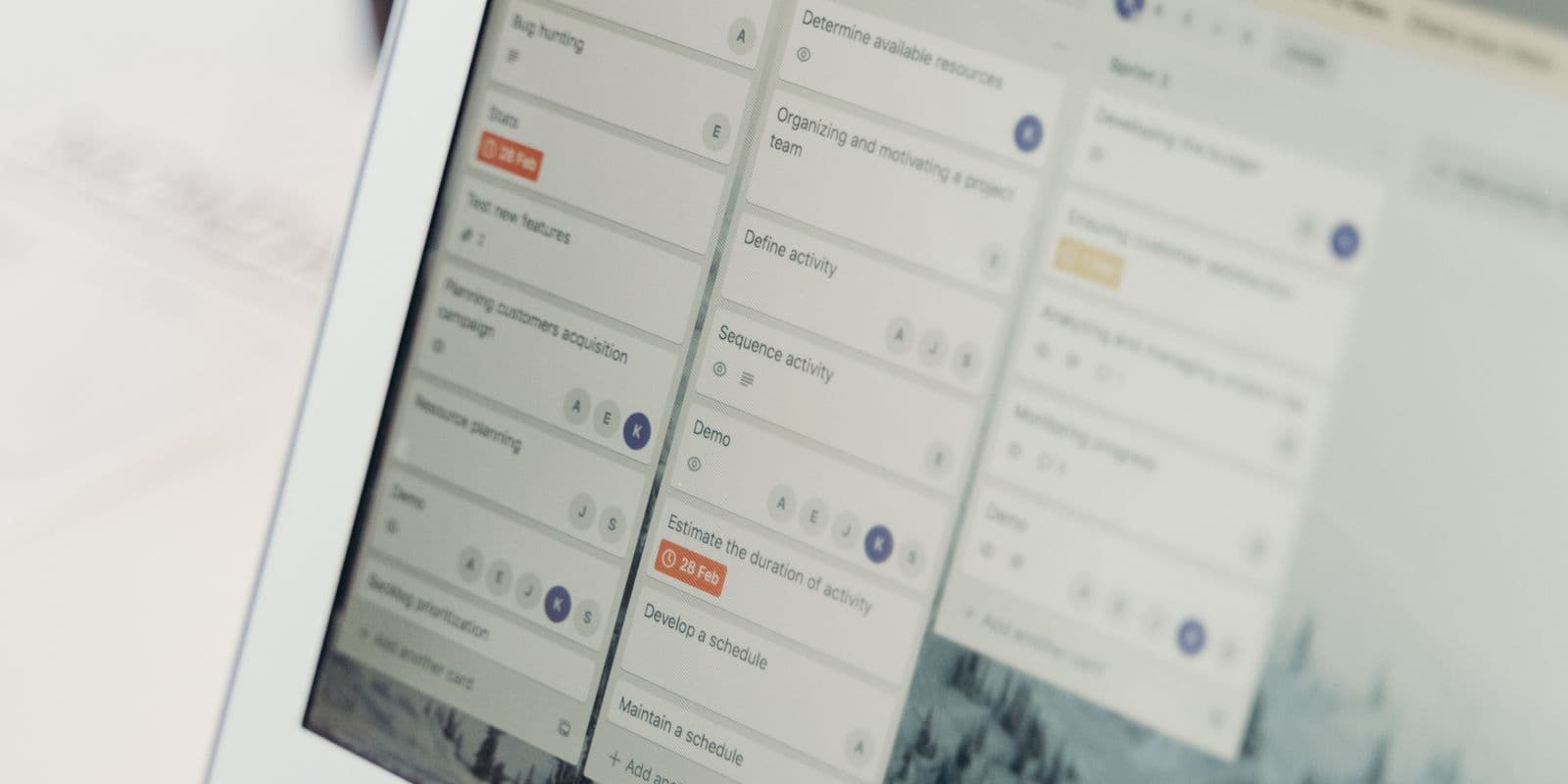 Kanban board interface with task cards across several columns